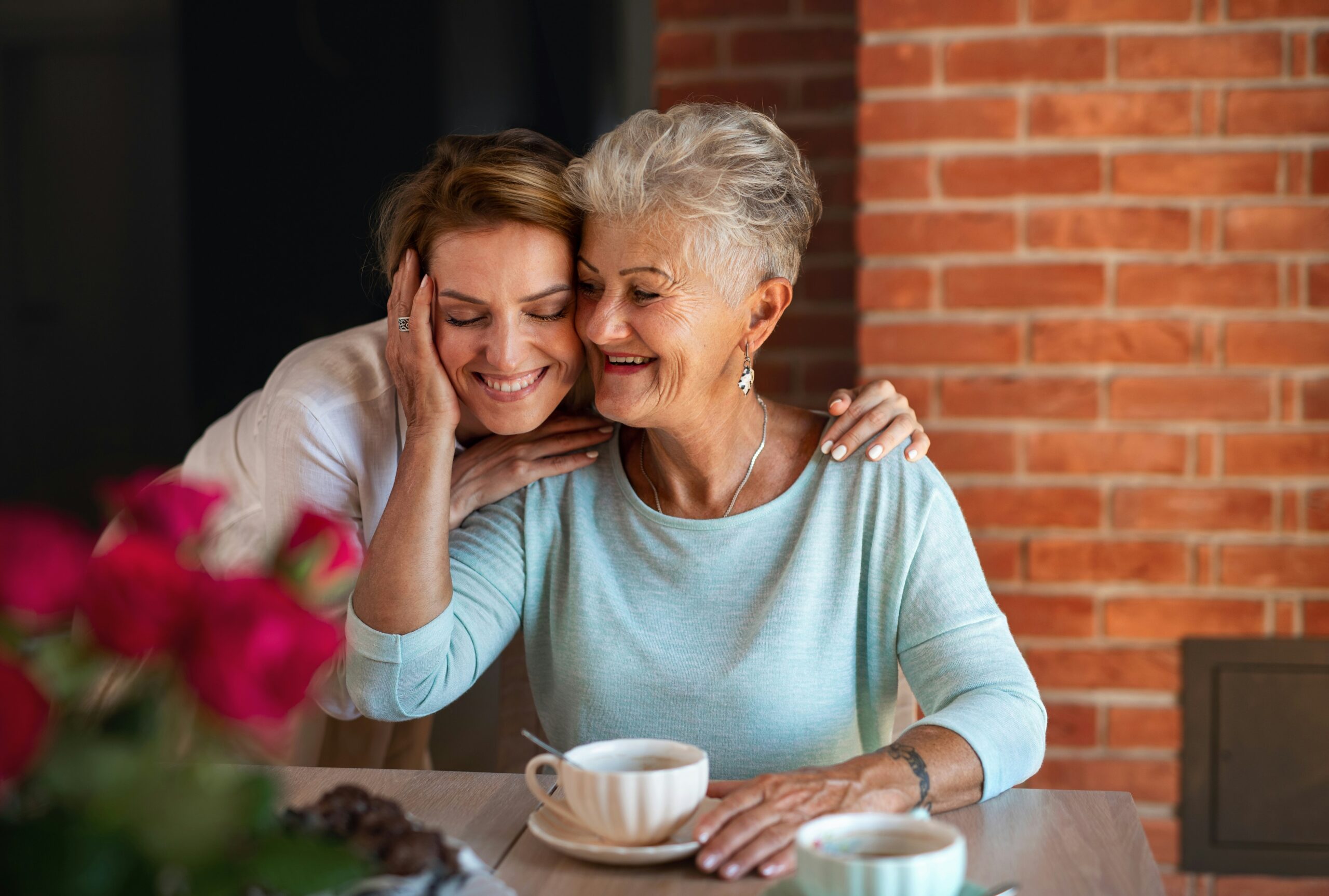 Mother and daughter embracing